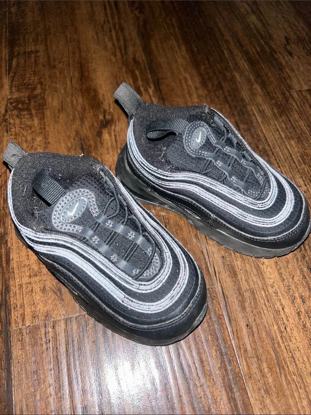 Nike Kids Black and Gray Slip-On Sneakers with Reflective Accents